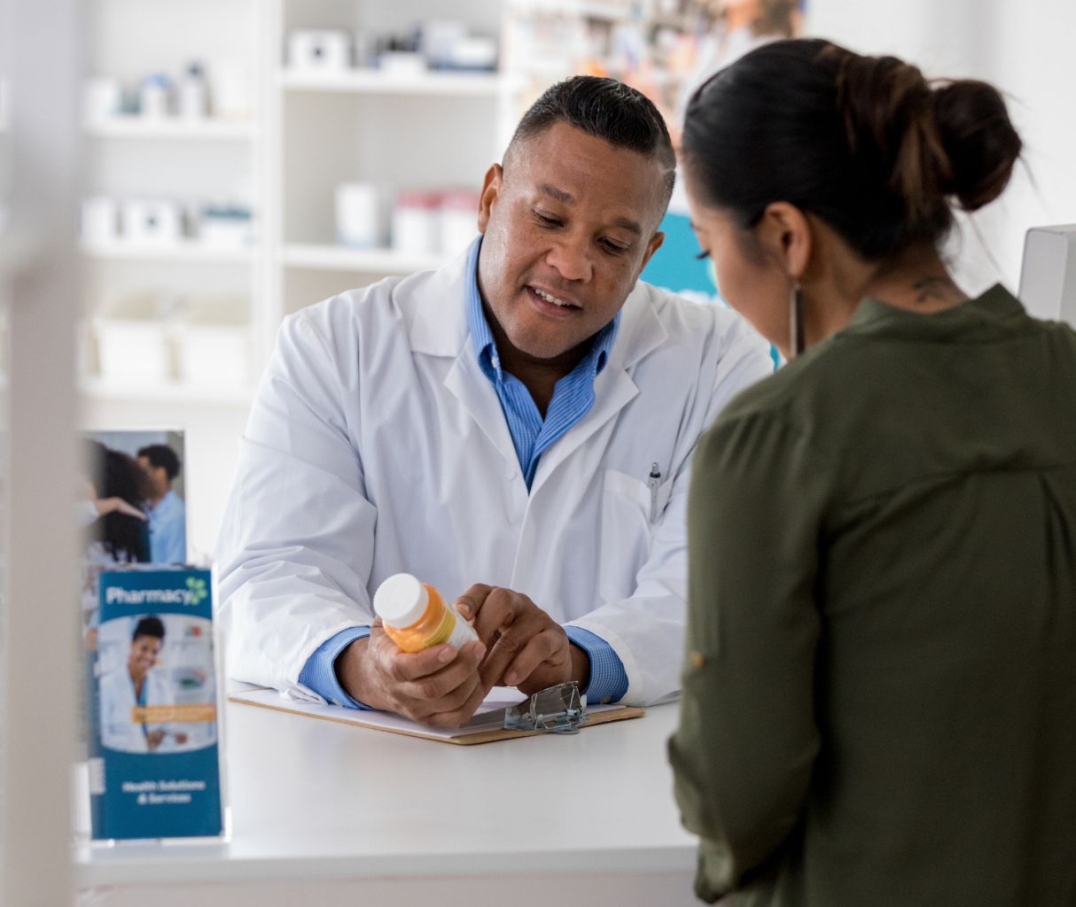 Pharmacist with customer